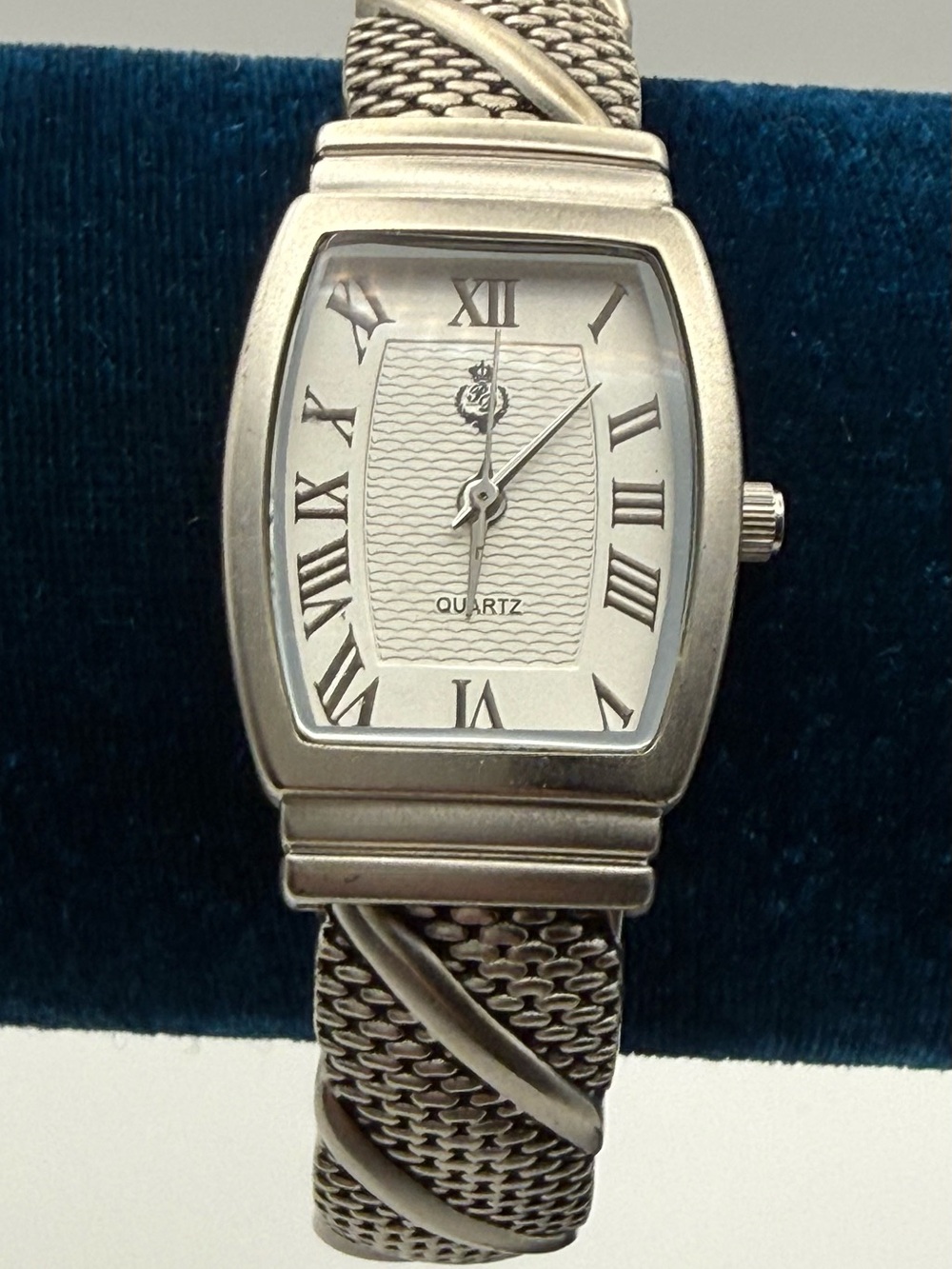 Premier Designs “On Time" silver-tone cuff watch.